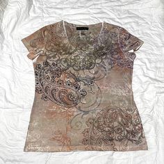 Appropriate Behavior Brown Paisley And Floral Short Sleeve Tee Shirt Size Small Bought New Never Worn Carefully Stored Away 100% Polyester Gold Floral Overlay Brown Short Sleeves Black Paisley Designs Purple Paisley Designs Orange Flower Designs Tan Flower Designs Soft Fabric Measurements In Photos Items Are Freshly Laundered Non Smoking Pet Friendly Home Fast Shipping Poshmark Ambassador Poshmark Party Host Thank You Funky Tops Women, Brown Paisley Print Summer Tops, Casual Brown Paisley Print Tops, Summer Brown Paisley Print Tops, Black And Tan Outfit, Tan Outfit, Baggy Shirts, Grunge Shirt, Brown Paisley