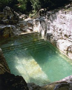 a pool in the middle of some rocks