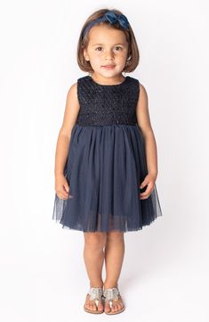 A tweed bodice entwined with shimmery threads lends retro energy to this adorable kid-sized dress with a flowy tulle skirt that's perfect for twirling. Cotton lining Bodice is 100% polyester; skirt is 100% cotton Hand wash, line dry Imported Navy Tulle Dress, Polyester Skirt, Tulle Dress, Nordstrom Dresses, Tulle Skirt, Bodice, Hand Wash, Nordstrom, Energy