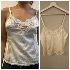 New Without Tags. I Bought This New With Tags Originally, Removed Them, And Then It Sat In My Closet Ever Since & Now It Doesn't Fit I Love This Cami For So Many Reasons! One Is I Was A Big Madonna Fan When I Was A Child, I Love Lace Everything. Ivory Nylon Satin Body With Floral Lace Trim V-Neck, Smaller Scale Lace Trim On Hem And The Back, Adjustable Straps, Soft Material. Intended To Be A Slip, Can Be Worn As Undershirt, Night Shirt Or Just As A Regular Top As I Meant To. Looks Great Tucked In Or Untucked. Flattering Fit 22" Length X 19" Pit-Pit (Length Taken At Full Length The Adjustable Straps Go, So This Can Be Shorter If Desired) Size Says 38 1980's Cream Ivory Sexy Feminine Br Cream Camisole Top With Built-in Bra, Vintage Sleeveless Top With Built-in Bra, Vintage Camisole Top For Daywear, Vintage Cami Top For Daywear, Vintage White Camisole For Daywear, Cream Fitted Top With Spaghetti Straps, White Vintage Camisole For Daily Wear, Cream Fitted Spaghetti Strap Top, Vintage Sleeveless Camisole With Built-in Bra