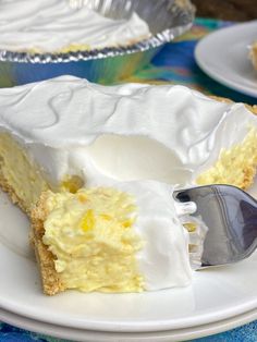 a piece of lemon meringue pie on a plate