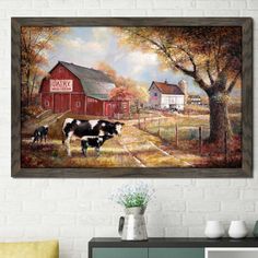 a painting on the wall of a farm with cows and a barn in the background