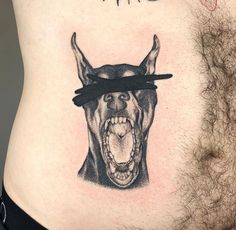 a man with a bull tattoo on his stomach