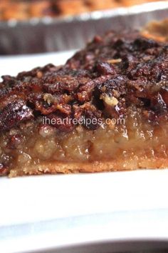 a piece of pie sitting on top of a white plate