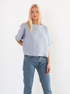 "BEE is a simple loose fitting short sleeve linen top. DETAILS - Boat neckline - Short sleeve - Kimono sleeves - Pullover design - Cropped length - 100% lightweight European linen fabric - Cut and sewn to order just for you in our studio COLOR - Bluestone, you can also choose other colors above - Fabric samples are available here https://www.etsy.com/listing/586569696/linen-fabric-samples SIZING & FIT - Fits true to size - Length is approximately 20 inches / 51.5 cm - Bust (pit to pit) is ap Effortless Boxy Short Sleeve Top, Effortless Short Sleeve Tops, Boxy Short Sleeve Blouse For Spring, Spring Boxy Short Sleeve Blouse, Linen Short Sleeve Tops For Everyday, Flax Color Cotton Short Sleeve Tops, Flax Color Short Sleeve Cotton Tops, Short Sleeve Cotton Tops In Flax Color, Boxy Short Sleeve Blouse For Summer