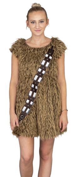 a woman wearing a chewy costume with a star wars belt on her chest and legs