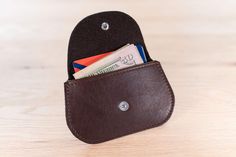 Our KW Purse and matching Minimalist Wallet are handmade from American Bison leather and Made in USA. We offer this matching purse and wallet in Brown, Black, and American Chestnut Red leather. Red Leather Wallets For Everyday Use, Minimalist Leather Bifold Wallet, Purse And Wallet Set, Black Textured Leather Travel Wallet, Versatile Soft Leather Wallets For On-the-go, Compact Red Leather Wallet, American Chestnut, Bison Leather, American Bison