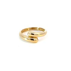 Prepare to bask in the glow of admiration! Our Solid Rendezvous Ring is more than just a piece of jewelry, it’s the meeting point for casual and everyday elegance. Crafted in 14K Gold you will love the smooth contours and unique feminine silhouette. It's ideal design makes it versatile enough to complement any outfit, from casual jeans and a tee to an evening dress. You will love all the ways you will wear it. Pairs beautifully with our Solid Rendezvous Hoop Earrings.

Size: 8mm (W)
14K Solid Go Modern Twist Yellow Gold Bypass Ring, Modern Twist Yellow Gold Bypass Ring For Formal Occasions, Modern 14k Gold Bypass Ring For Formal Occasions, Modern Twist 14k Gold Bypass Ring For Formal Events, Minimalist Polished Bypass Ring For Formal Occasions, Modern Twist Yellow Gold Stackable Rings For Formal Occasions, Minimalist Yellow Gold Bypass Ring For Formal Occasions, Modern Twist Yellow Gold Stackable Rings With Polished Finish, Modern 14k Gold Bypass Ring With Open Band