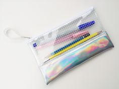 "Pencil Case,Holographic Clear Bag,Makeup Bag,Cosmetic bag,Back to School,Transparent bag,Gift for Her If you are shopping for a pencil case. Bag accessories for back to school. This bag is perfect. The transparent bag makes it easy to see the equipment. Cosmetic or used on a daily basis. Details measures Height:    4.5 \" Width:      7.5 \"  Estimated shipping times Austria: 7-21 business days United States: 7-21 business days Europe: 2-3 weeks Australia, New Zealand and Oceania: 2-3 weeks Asia Pacific: 7-14 business days" Simple Makeup For Teens, Natural Makeup For Teens, Clear Pencil Case, Holographic Bag, Natural Makeup Tips, Bags For Teens, Cute Stationary, How To Apply Eyeliner, Makeup For Teens