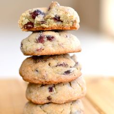 a stack of cookies sitting on top of a wooden table