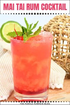 a close up of a drink in a glass on a table with the words mai tai rum cocktail