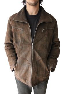 Vintage 90s leather Jacket in brown, size L A brown suede leather jacket with a zipper, made of genuine suede, is a true symbol of style and elegance. Its soft material creates a pleasant feeling of comfort and warmth, while at the same time emphasizing the individuality and character of its wearer. A stylish vintage 90s-inspired jacket is a successful combination of classic and modern elements. Its simple yet refined lines add sophistication to the look, highlighting the wearer's impeccable taste and style. The suede surface creates a striking matte brown shade, giving the jacket a special charm and luxurious appearance. This natural material provides the jacket with durability and a unique look, as well as reliable protection against wind and light rain. The presence of zippered pockets Classic Luxury Leather Jacket With Suede Lining, Luxury Leather Jacket With Suede Lining, Luxury Classic Suede Leather Jacket, 90s Leather Jacket, Brown Suede Leather Jacket, Suede Leather Jacket, Modern Elements, Brown Shades, 90s Inspired