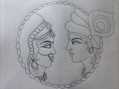 a drawing of two women facing each other with their faces in the same circle on paper