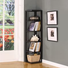 a corner shelf with books and magazines on it in a room next to a door