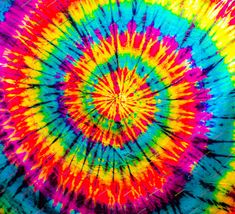 a colorful tie - dyed background with lots of colors