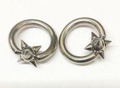 14g Stainless Captive Spiked Bead Ring Captive Bead Rings 14g - 15/32" diameter (12mm) Stainless Steel Captive Bead Ring, Nostril Ring, Belly Button Piercing Jewelry, Septum Jewelry, Body Jewelry Piercing, Body Mods, Pretty Earrings, Jewelry Inspo, Beaded Rings