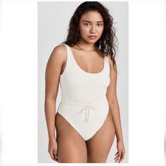 Questions? Leave A Comment Below! Beige Beachwear Bodysuit For Summer, Beige Summer Beachwear Bodysuit, Fitted Beige Bodysuit For Poolside, Beige Bodysuit For Vacation, Fitted One-piece Cream Swimwear, Fitted Cream One-piece Swimwear, Cream Fitted One-piece Swimwear, Beige One-piece Bodysuit For Spring, Spring Beige One-piece Bodysuit