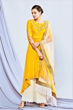 Ethnic and absolutely stunning yellow embroidered asymmetric kurta with white palazzo and dupatta for festive occasions from Abirr and Nanki Pakistani Mehndi Dress, Asymmetric Kurta, Kurta Patterns, White Kurta, Pakistani Dresses Casual, Kurta Dress, Amazon Buy, Indian Fashion Designers