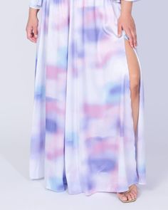 Pair this plus-size pleated maxi skirt with the matching crop top. Spring Beach Skirt With Split Hem, Flowy Full-length Maxi Skirt With Side Slits, Spring Floor-length Lined Skirt, Beach Skirt With Side Slits, Beach Skirt With Side Slits And Split Shape, Beach Skirt With Side Slits And Split, Vacation Skirt With Side Slits And Split, Maxi Skirt With Side Slits, Spring Maxi Bottoms With Side Slits