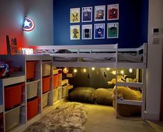 there is a bunk bed in the room with lights strung from it's sides