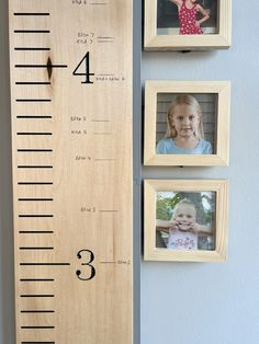 a ruler with three pictures hanging on the wall next to it and two children's faces