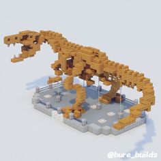 an animal made out of lego blocks sitting on top of a white surface with no people around