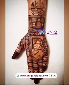 the hand is decorated with hendi designs and an image of a woman's face