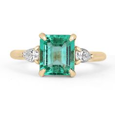 Crazy Rich Asians Emerald Ring, Classic Trillion Cut Emerald Ring With Prong Setting, Elegant Vvs Clarity Trillion Cut Emerald Ring, Classic Emerald Trillion Cut Ring, Classic Trillion Cut Emerald Ring, Elegant Gia Certified Trillion Cut Emerald Ring, Classic Pear-shaped Emerald Ring For Anniversary, Elegant Trillion Cut Emerald Ring, Elegant Trillion Cut Gia Certified Emerald Ring