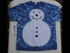 a blue and white tie dye shirt with a snowman face on it's chest