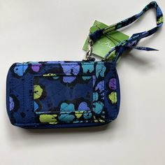 Vera Bradley All In One Wristlet Indigo Pop Pattern Zip Section For Cash/Change Multiple Credit Card Capacity Window For Photo Id Blue Bags With Wrist Strap For Daily Use, Blue Rectangular Casual Wristlet, Casual Blue Rectangular Wristlet, Blue Rectangular Bag With Wrist Strap, Blue Rectangular Wristlet For Everyday Use, Blue Wristlet For Travel, Blue Adjustable Wristlet For Everyday Use, Adjustable Blue Wristlet For Everyday Use, Blue Rectangular Wristlet With Zipper