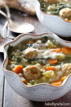 two white bowls filled with meat and vegetable soup