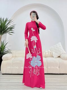 🌻Material: Lụa 🌻Stretchy level: 2/10 🌻 The measurement of this ao dai (long dress) is in Vietnamese size (American size tends to be bigger for the same size). Please LOOK AT THE SIZE CHART CAREFULLY BEFORE ORDERING. There might have some chalk writings on the fabric due to making process. These marks can be washed away easily. 🌻🌻No returns or exchanges Buyer can contact seller about any issues with an order. 🌸 Follow us Facebook/aodaiemily www.aodaiemily.com 💜 Thank you very much!💜 Embroidered Long Sleeve Ao Dai For Party, Traditional Embroidered Ao Dai, Pink Fitted Long Ao Dai, Traditional Embroidered Ao Dai For Party, Long Fitted Pink Ao Dai, Spring Embroidered Red Ao Dai, Spring Festive Embroidered Ao Dai, Traditional Pink Long Sleeve Ao Dai, Red Embroidered Fitted Ao Dai