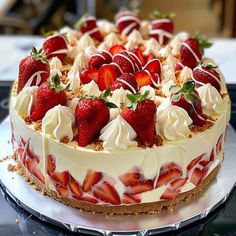 a cake with strawberries and cream on top