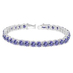 Wear this stylish bracelet to enhance your daytime and evening attire. This attractive tennis bracelet displays 5mm round cut gemstones in a polished prong setting that is perfect for evening wear and statement pieces. The bracelet is crafted of fine sterling silver and is nickel & tarnish free. It measures 7.25 inches and secures by box and tongue plus a safety latch. This gem bracelet in fine jewelry is a great addition to your tennis bracelets and gemstone jewelry collections. Product Det Formal Adjustable Bracelets With Gemstone Accents, Adjustable Formal Bracelets With Gemstone Accents, Adjustable Gemstone Accents Bracelets For Formal Occasions, Bracelet Displays, Bow Bracelet, Gems Bracelet, Bracelet Display, Stylish Bracelet, Topaz Gemstone