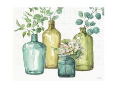 three green glass vases with flowers in them