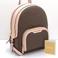 Michael Kors Jaycee Medium Backpack Brown / Pink Signature Color Backpack Logo-Print Canvas 89.4% Coated Canvas/9.6% Polyester/1% Polyurethane Trim: 60% Polyurethane /20% Polyester/20% Cotton Gold-Tone Hardware 8.75”W X 12”H X 4.25”D Exterior Details: Front Zip Pocket Interior Details: Back Zip Pocket, Tech Compartment, Front Slip Pocket Lining: 100% Polyester Zip Fastening Imported Purse Charms Diy, Jelly Purse, Studded Backpack, Michael Kors Backpack, Colorful Backpacks, Exterior Details, Medium Backpack, Black Leather Backpack, Powder Blush