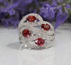 Stunning 3 ct Natural Diamonds and Oval Red Ruby Waves Lines Luxury Cocktail Ring in 14K White Gold, Anniversary - Birthday Gift. This item was designed and handmade in USA. This item is in stock and can be shipped right away. Please, allow 1-2 business days for processing. Photos of an actual item you will receive! Only 1 in stock. Ring size: 7 US size (free resizing), Metal type: white gold, Metal purity: 14K, Total weight: 9.41 gr, Center gemstone: 4 natural rubies, oval cut, red color, treat Dazzling Oval Ruby Ring For Anniversary, Oval Multi-stone Ruby Ring For Anniversary, Dazzling Red Oval Ring, Waves Line, Gold Anniversary, Luxury Rings, Gold Halo, Diamond Cluster Ring, Engagement Anniversary