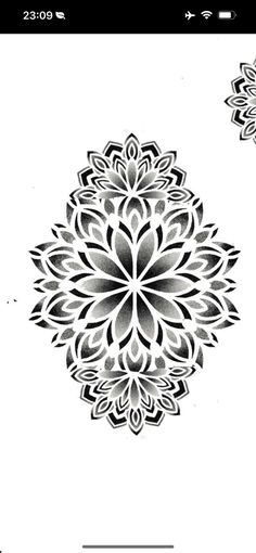 an image of a black and white flower design on a cell phone screen, with the text