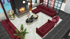 a living room filled with red couches next to a fire place in a house