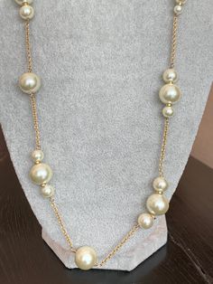 Vintage J Crew necklace. This is a single strand gold tone chain with faux pearls. Signed on the clasp. Gold Long Necklace With Pearl Chain For Formal Events, Gold Long Necklace With Pearl Chain For Formal Occasions, Gold Pearl Long Necklace For Formal Occasions, Pearl Necklaces With Gold Chain For Party, Party Pearl Necklace With Gold Chain, Pearl Necklace With Gold Chain For Party, Formal Pearl Necklace With Gold Chain, Classic Gold Pearl Necklace For Party, Gold Single Strand Chic Pearl Necklace