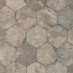 an image of hexagonal stone tiles that look like they have been used as wallpaper