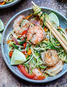 shrimp and vegetable stir fry with chopsticks in a bowl