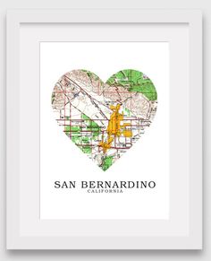 a heart shaped map print with the words san bernardo in green, yellow and white