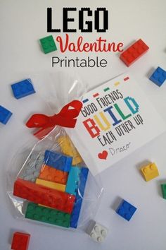 a bag filled with lego blocks and a card that says lego valentine printable on it