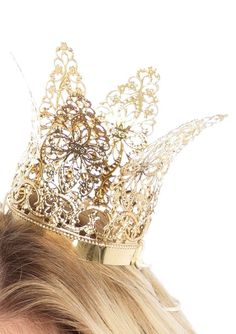 From Wonderland queen to DIY costumes, you'll rule the kingdom in style with the Leg Avenue Mini Metal Filigree Crown. The delicate mini crown adds a touch of glamour to any queenly costume with fancy filigree details, glistening metal and iconic curved tips. No matter how many heads you make roll, an elastic headband keeps the mini crown in securely place. For a ravishingly royal costume, upgrade the Leg Avenue 2-Piece Wonderland Queen with this golden mini crown. One Size Fits Most Adults and Royal Costume, Halterneck Mini Dress, Mini Crown, Wonderland Costumes, Costume Themes, Elastic Headband, Leg Avenue, Crown Headband, Gold Crown