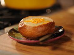 a baked potato sitting on top of a plate