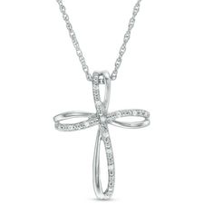 Simple and sparkling, this diamond cross pendant elegantly reflects your faith. Created in sterling silver, this open-worked cross showcases loop ribbons in alternating polished and diamond-accented beaded finishes. Buffed to a brilliant luster, this pendant suspends along an 18.0-inch rope chain that secures with a spring-ring clasp. Silver Crucifix Jewelry With Diamond Accents, Silver Diamond Cross Necklace For Anniversary, Silver Cross Necklace With Diamond Accents, Silver Cross Pendant Necklace In Fine Jewelry Style, Peoples Jewellers, Necklace Clasps, Diamond Cross Pendants, Diamond Cross, Cross Jewelry