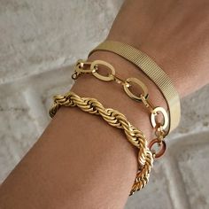 PRODUCT DESCRIPTION Gold bracelet stack for woman / gold chain bracelet / 18k gold bracelet / stacking bracelet / gold chain bracelet / set Beautiful gold statement stacking bracelets: mesh belt, thick rope, and link chain. These gold chain bracelets for women are definitely a must-have for your bracelet stacks collection! You'll love it, it's simply chic and resistant which creates the perfect look! You can choose the bracelet you like or take the full discounted set. MEASUREMENT AND SIZE (on t Everyday Gold Chunky Bracelets, Adjustable Gold Chunky Chain Bracelet, Formal Gold-plated Bracelet With Chunky Chain, Gold-plated Chunky Chain Bracelet, Elegant Gold-tone Chunky Chain Bracelet, Luxury Gold-plated Chunky Chain Bracelet, Gold Bracelets Stacked, 18k Gold Bracelet, Chunky Bracelets