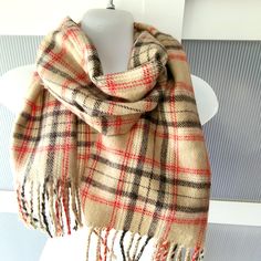 This is a classic plaid scarf for men and women. The scarf is beige brown with a red plaid design. The scarf is in excellent condition and will make a beautiful gift! The scarf is acrylic, excellent for fall season and mild winter. It measures 12x62 inches. It comes in a gift wrap and with a 'Thank you' card. For more scarves in my store visit: https://www.etsy.com/ca/shop/NostalgicByLiliya?ref=seller-platform-mcnav&section_id=25031148 For other items visit: https://www.etsy.com/ca/shop/Nostalgi Brown Tartan, Soft Accessories, Beige Plaid, Tartan Scarf, Wrap Jacket, Winter Gift, Scarf Men, Plaid Design, Neck Wrap