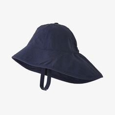 Patagonia Baby Block-the-Sun Hat in New Navy is a full-brimmed safari-style hat with a drape in back for neck coverage. When the wind starts whipping, the nonchafing, adjustable chin strap keeps the hat secure. Made of NetPlus® 100% postconsumer recycled nylon faille made from recycled fishing nets to help reduce ocean plastic pollution; with a PFC-free DWR finish (durable water repellent coating that does not contain perfluorinated chemicals) and 50+ UPF sun protection. Fair Trade Certified™ se Patagonia Baby, Baby Patagonia, Patagonia Kids, Kids Blocks, Baby Sun Hat, Fishing Nets, Sun Protection Hat, Toddler Hat, Baby Blocks